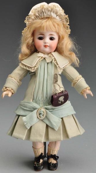EARLY S & H 908 CHILD DOLL.                       