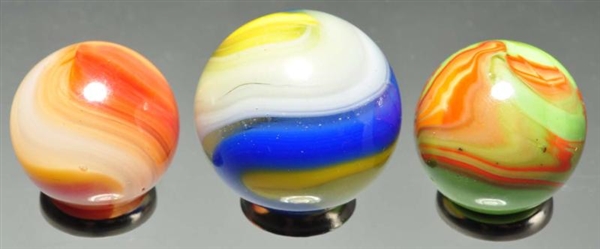 LOT OF 3: MACHINE MADE MARBLES.                   