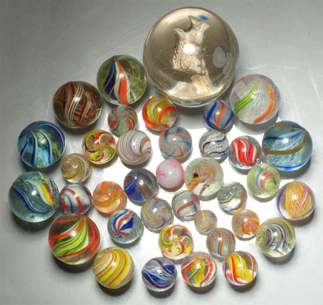 LOT OF 37: ASSORTED HANDMADE MARBLES.             