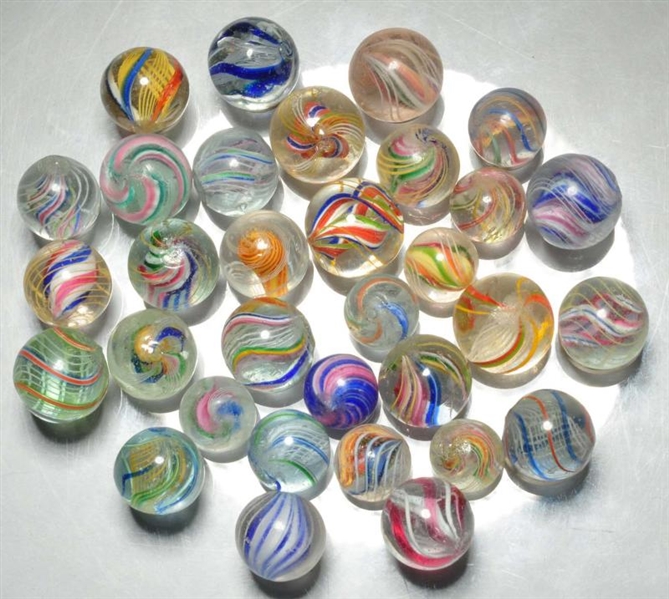 LOT OF 32: ASSORTED HANDMADE MARBLES.             