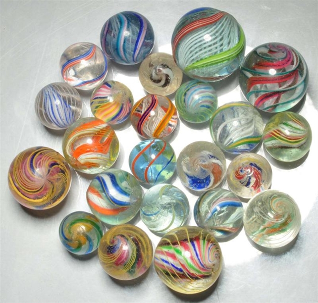 LOT OF 23: ASSORTED SWIRL MARBLES.                