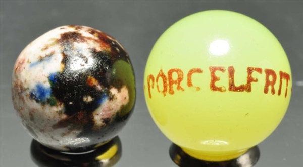 LOT OF 2: ODD MARBLES.                            