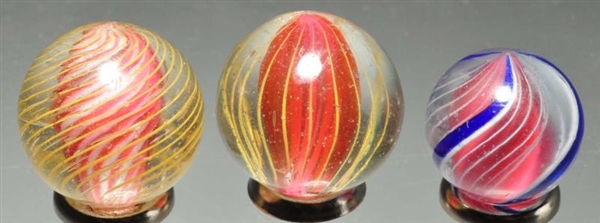 LOT OF 3: SMALL SWIRL MARBLES.                    