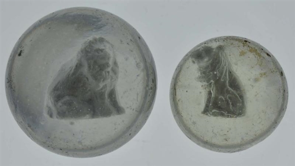 LOT OF 2: SEATED LION SULPHIDE MARBLES.           