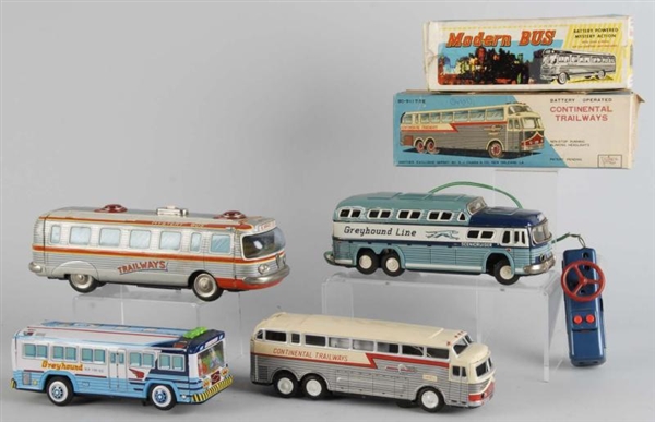 LOT OF 4: TIN BUS BATTERY-OPERATED TOYS.          