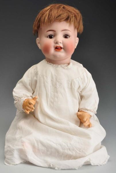 LARGE K & R 126 CHARACTER BABY DOLL.              