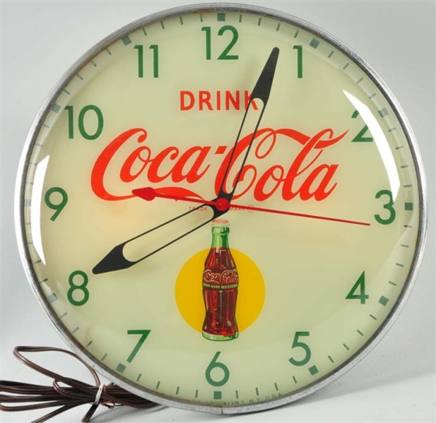 1950S COCA-COLA PAM ELECTRIC LIGHT-UP CLOCK.      