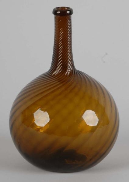 HAND BLOWN AMBER GLASS BOTTLE WITH PONTIL.        
