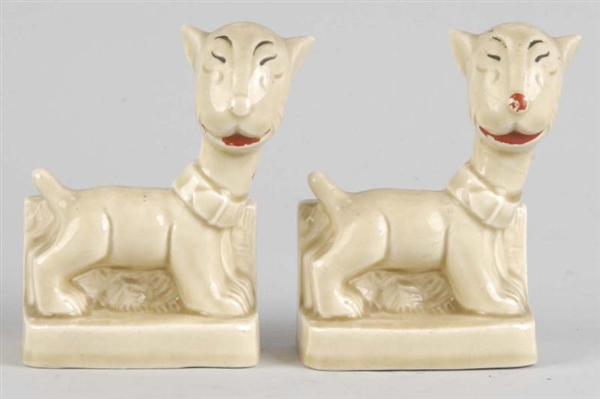 LOT OF 2: POTTERY ANIMAL BOOKENDS.                