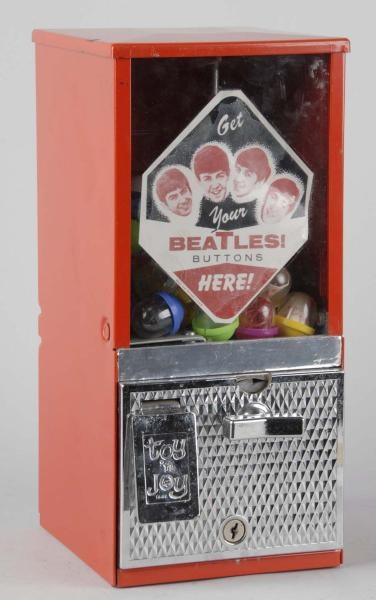 BEATLES COIN-OPERATED BUTTON VENDING MACHINE.     