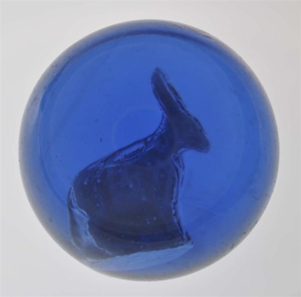 DONKEY SULPHIDE MARBLE IN COBALT BLUE GLASS.      