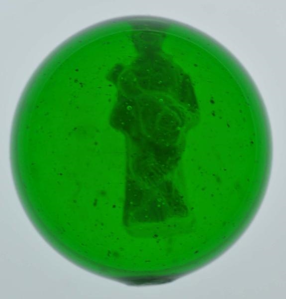 GREEN GLASS MANDOLIN PLAYER SULPHIDE MARBLE.      