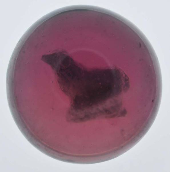 AMETHYST GLASS DOG SULPHIDE MARBLE.               