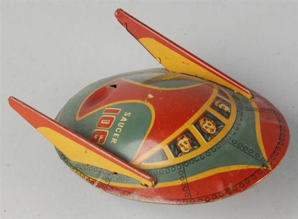TIN LITHO FLYING SAUCER SPACE FRICTION TOY.       