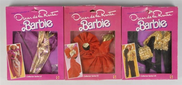 LOT OF 3: BARBIE OSCAR DE LA RENTA OUTFITS.       