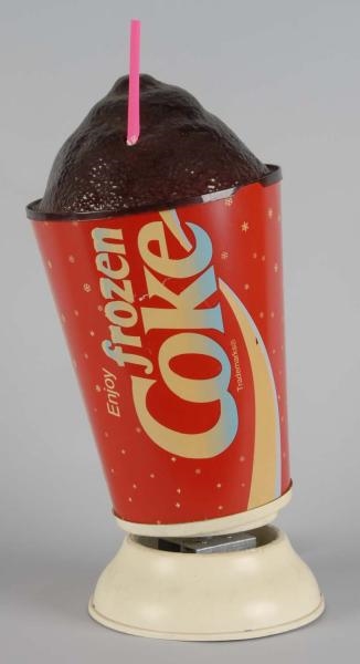 PLASTIC FROZEN COCA-COLA ROTATING LIGHTED SIGN.   