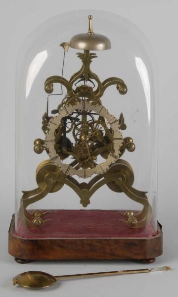 TWO TRAIN SKELETON CLOCK WITH CABLE DRIVEN FUSEE. 