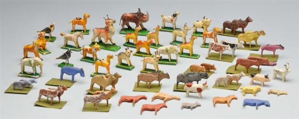 LOT OF WOOD AND PAPIER-MACHE ANIMALS.             