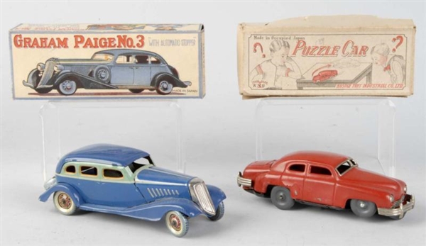 LOT OF 2: TIN AUTOMOBILE WIND-UP TOYS.            