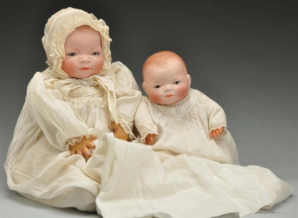 LOT OF 2: GERMAN BISQUE BYE-LO BABIES & CLOTHES.  