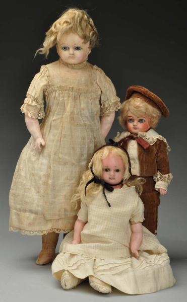 LOT OF 3: PATENT WASHABLE AND WAX GERMAN DOLLS.   