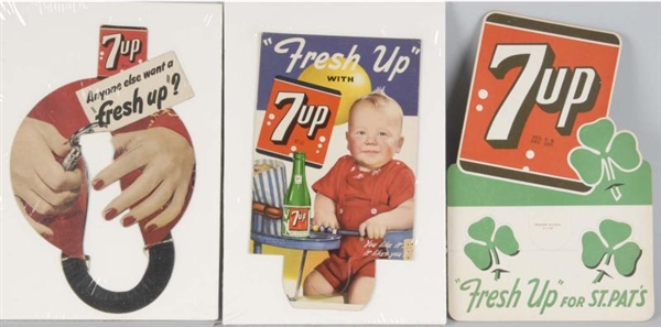 LOT OF 3: CARDBOARD 7UP BOTTLE TOPPERS.           