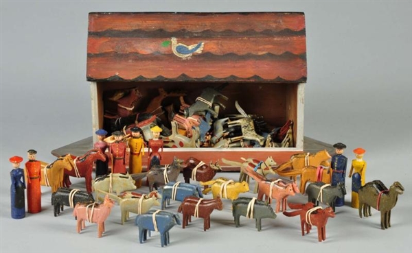 WOODEN NOAHS ARK WITH CARVED & PAINTED ANIMALS.  