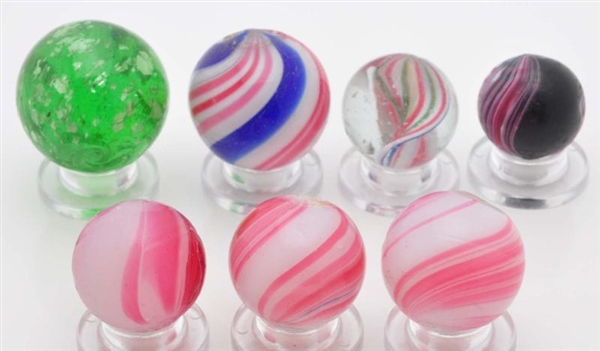 LOT OF 7: ASSORTED HANDMADE MARBLES.              