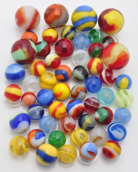 LOT OF 50+ AKRO MARBLES.                          