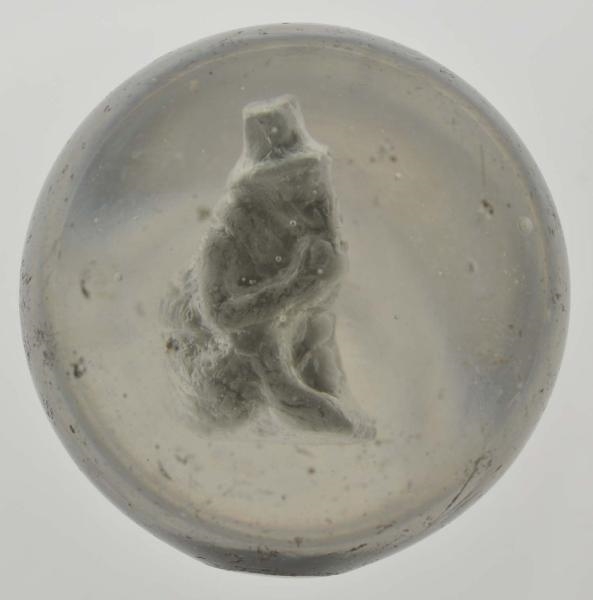 SEATED MONKEY SULPHIDE MARBLE.                    