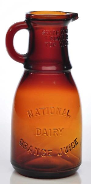 BROWN GLASS NATIONAL DAIRY ORANGE JUICE BOTTLE.   