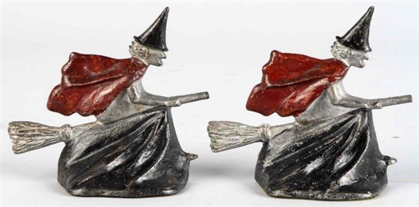PAIR OF CAST IRON WITCH ON BROOM BOOKENDS.        