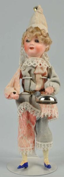 SMALL BISQUE DOLL FIGURE.                         