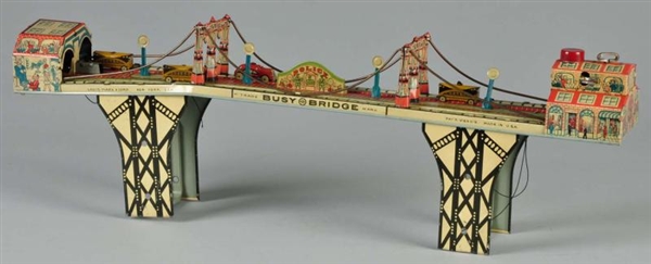 TIN LITHO MARX BUSY BRIDGE WIND-UP TOY.           