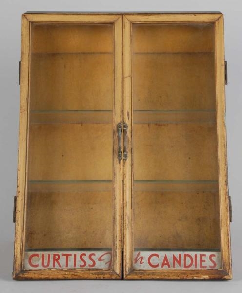 WOODEN CURTISS CANDIES SLANT FRONT DISPLAY CASE.  