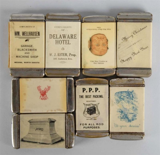 LOT OF 8: ASSORTED CELLULOID MATCH SAFES.         