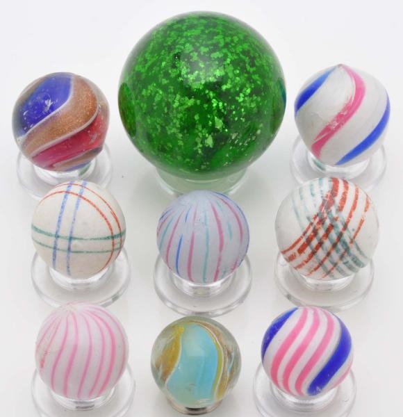 LOT OF 9: HANDMADE MARBLES.                       