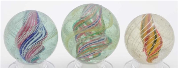 LOT OF 3: LARGE SWIRL MARBLES.                    