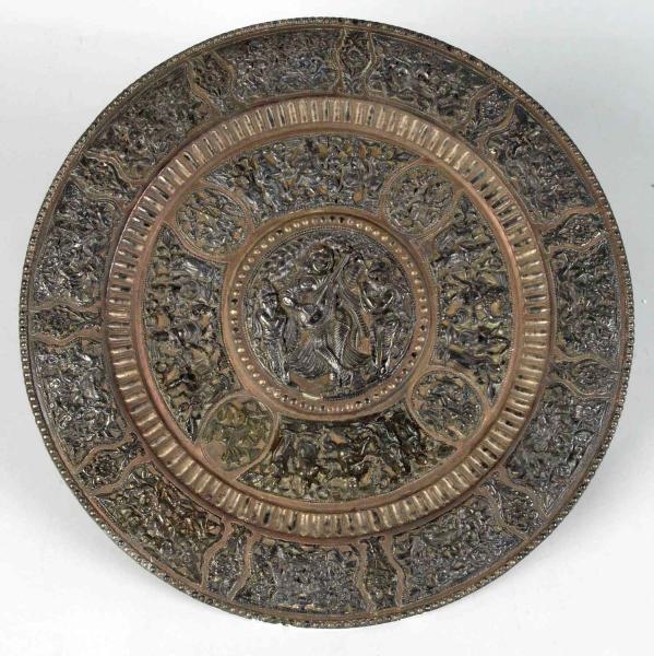 METAL PLAQUE WITH GUTTA-PERCHA INLAY WORK.        