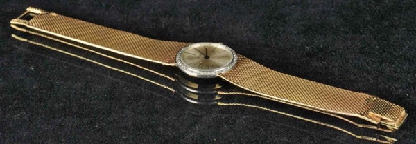 PIAGET 14K Y. GOLD WATCH WITH DIAMONDS.           
