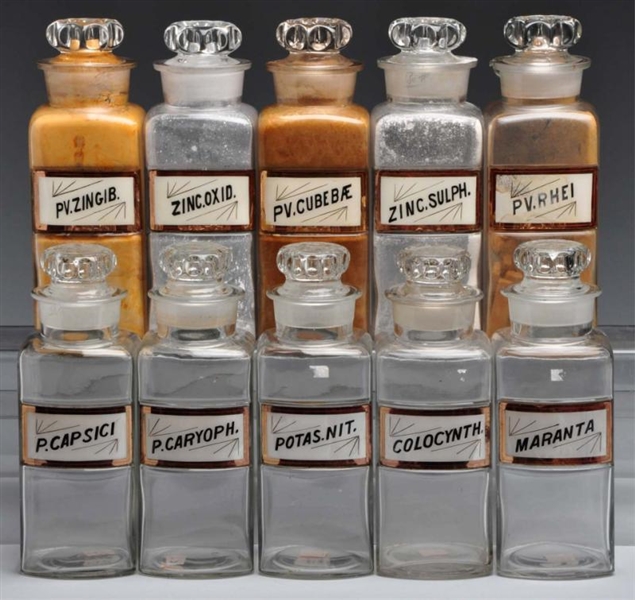 LOT OF 10: LABEL-UNDER-GLASS APOTHECARY JARS.     