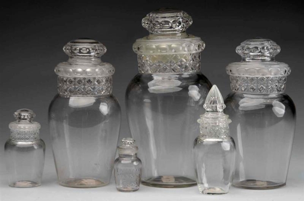 LOT OF 6: GLASS APOTHECARY CANDY JARS WITH LIDS.  