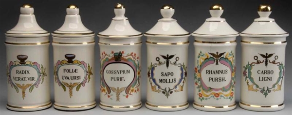 LOT OF 6: GILDED PORCELAIN APOTHECARY JARS.       