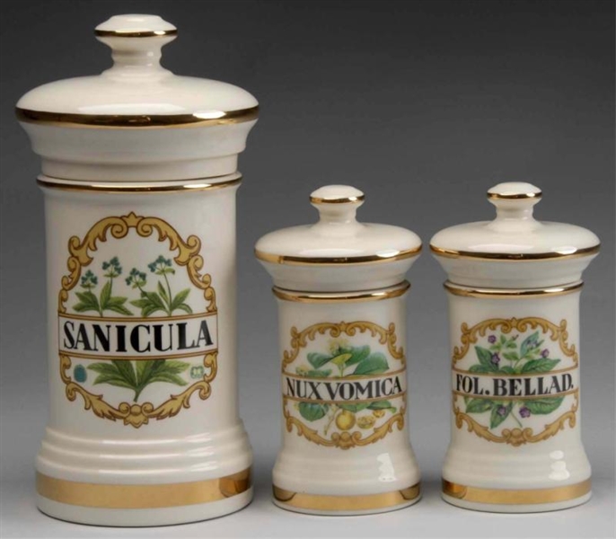 LOT OF 3: GILDED PORCELAIN APOTHECARY JARS.       