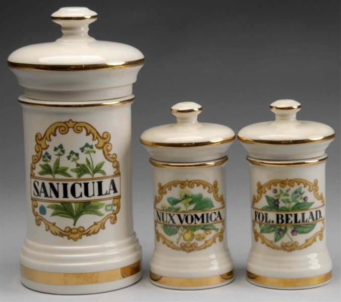 LOT OF 3: GILDED PORCELAIN APOTHECARY JARS.       