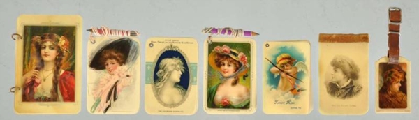 LOT OF 7: CELLULOID ADVERTISING PIECES.           
