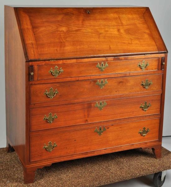 CHERRY SLANT TOP DESK WITH DRAWERS.               