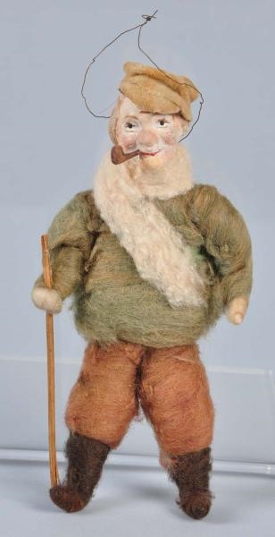 COTTON MAN WITH PIPE CHRISTMAS ORNAMENT.          
