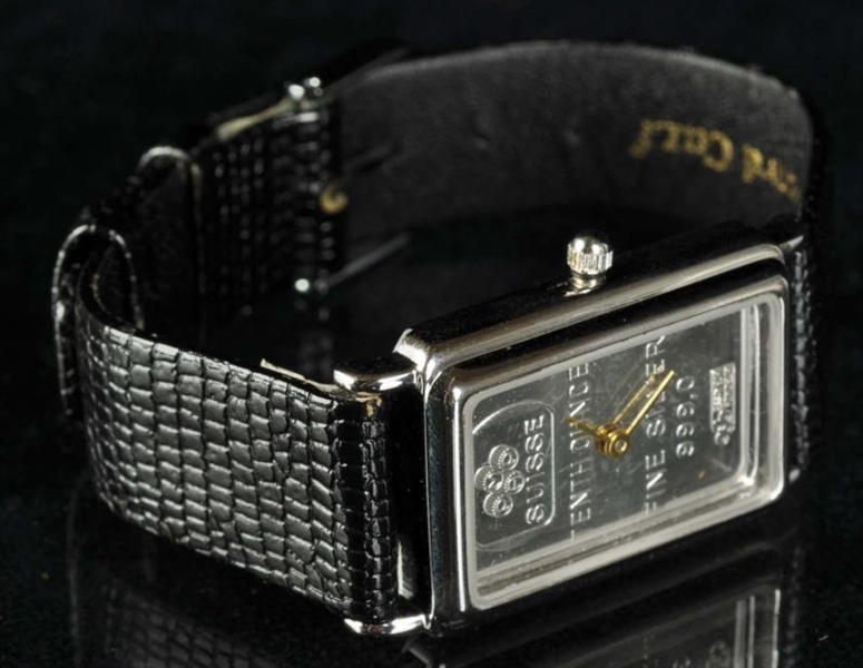SUISSE FINE SILVER WATCH WITH LEATHER BAND.       