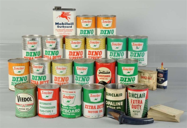 LARGE LOT OF MOTOR OIL TIN CANS.                  
